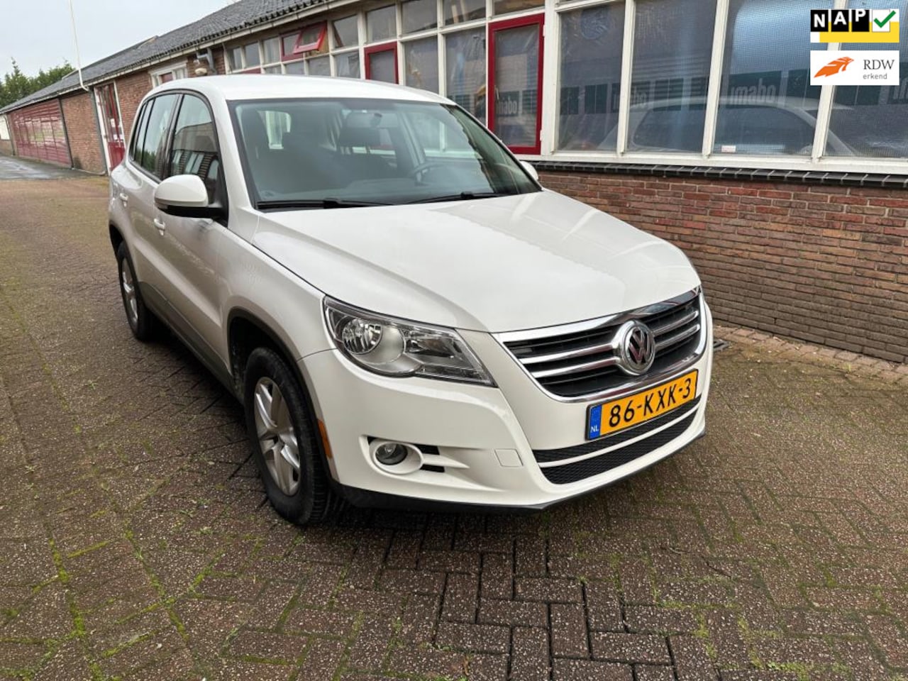 Volkswagen Tiguan - 2.0 TSI Track&Field 4Motion NAVI AIRCO SCHADEVRIJ - AutoWereld.nl