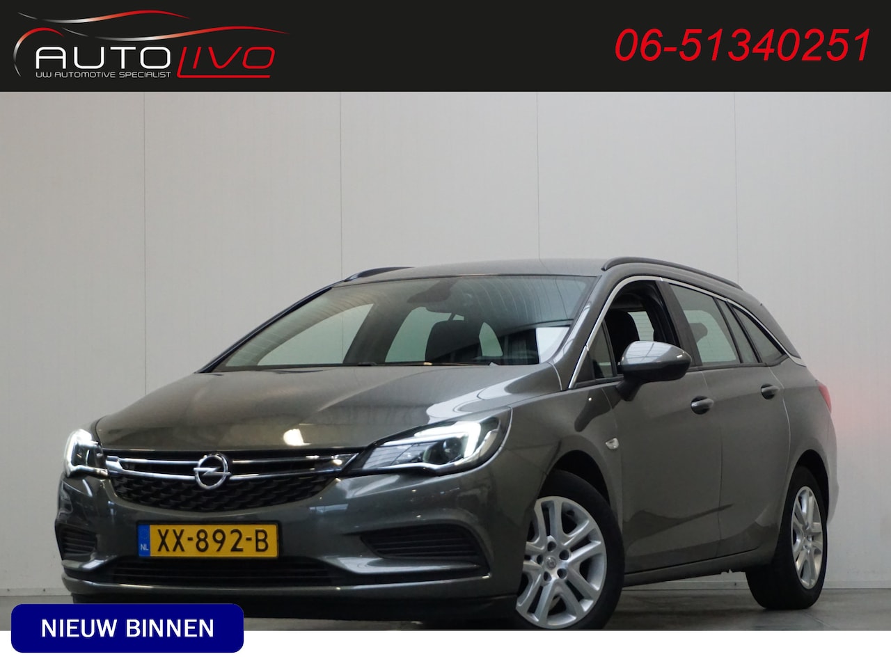 Opel Astra Sports Tourer - 1.6 CDTI Business+ NAVI AC CRUISE PDC etc. - AutoWereld.nl