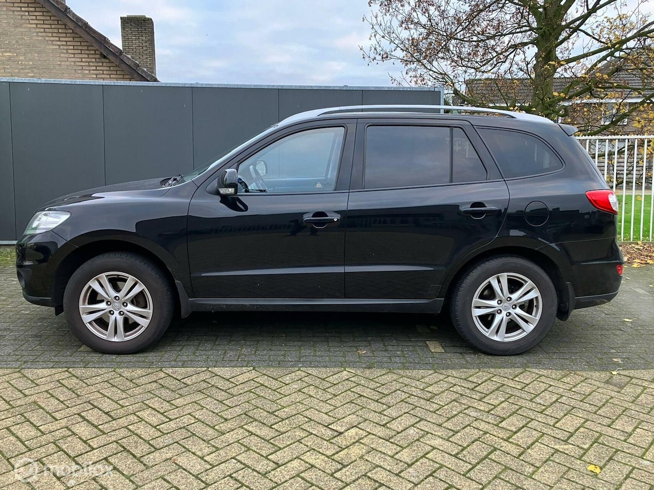 Hyundai Santa Fe - 2.4i CVVT Dynamic/Leer/Nav/Clima/Cruise - AutoWereld.nl