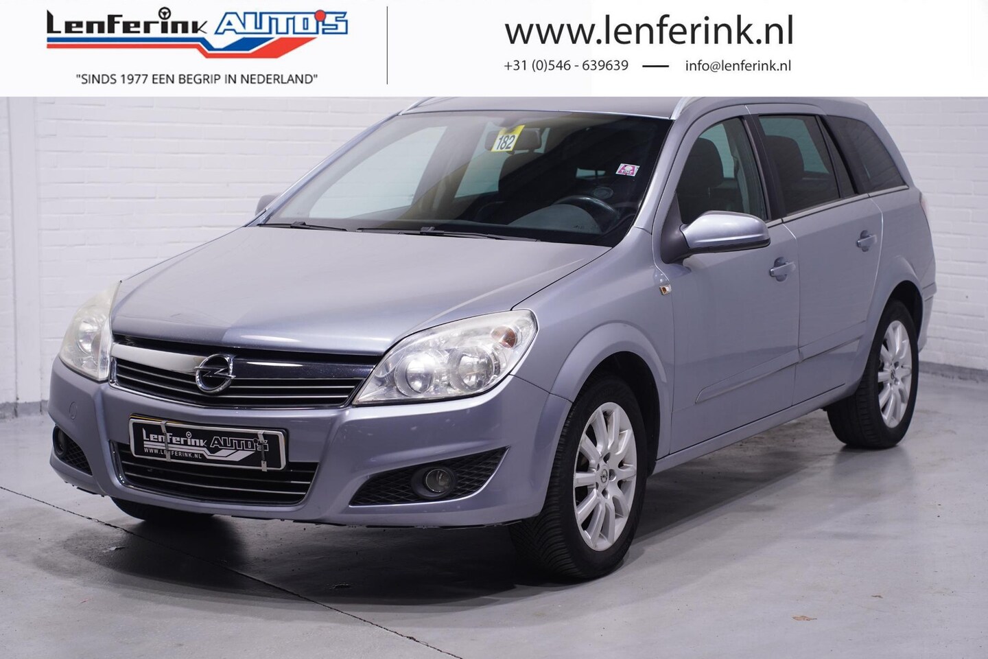 Opel Astra Wagon - 1.6 Executive Leder Navi Airco Trekhaak Stoelverwarming - AutoWereld.nl