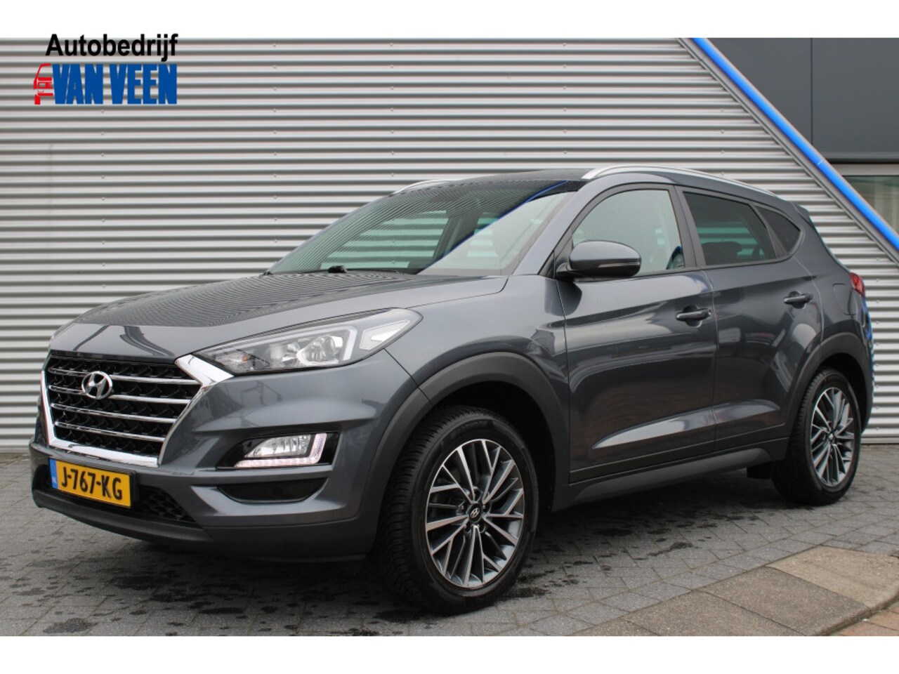 Hyundai Tucson - 1.6 GDI Comfort + Trekhaak | Navi | Camera | Leder | 18Inch - AutoWereld.nl