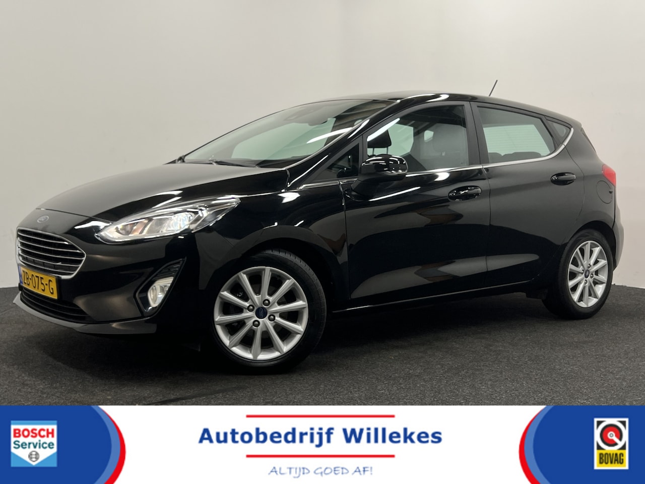 Ford Fiesta - 1.0 EcoBoost Titanium | NAVIGATIE | TREKHAAK | STOELVERWARMING | - AutoWereld.nl