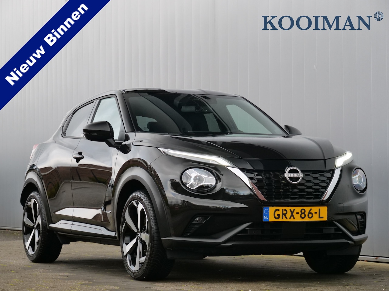 Nissan Juke - 1.6 Hybrid N-Design 143pk Tekna Navigatie / Leer / LED / 19Inch. - AutoWereld.nl