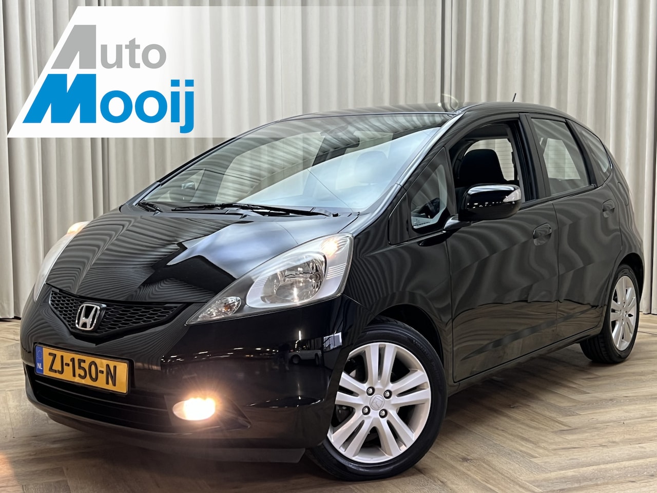 Honda Jazz - 1.4 Exclusive *Panoramadak* ECC-Clima / Cruise control / Bluetooth / Trekhaak / LMV 16" - AutoWereld.nl