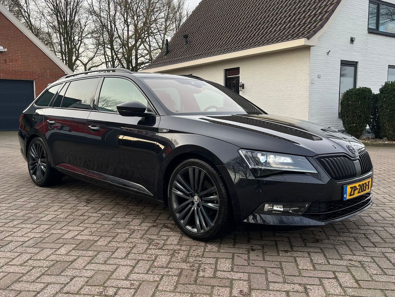 Skoda Superb Combi - 1.5 TSI ACT Sportline Business - AutoWereld.nl