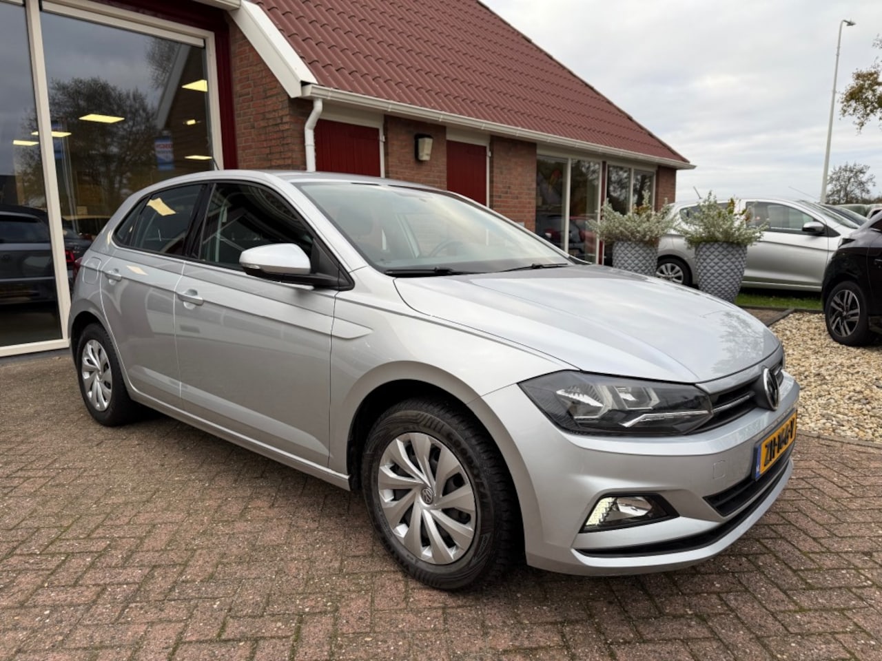 Volkswagen Polo - 1.0 TSI COMFORTLINE 5-DRS NAVIGATIE/CRUISE/RADIO/ENZ. - AutoWereld.nl