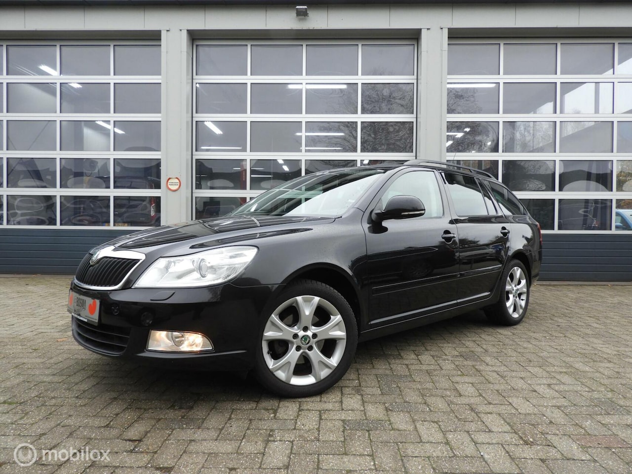 Skoda Octavia Combi - 1.2 TSI Schuifdak , leder - AutoWereld.nl