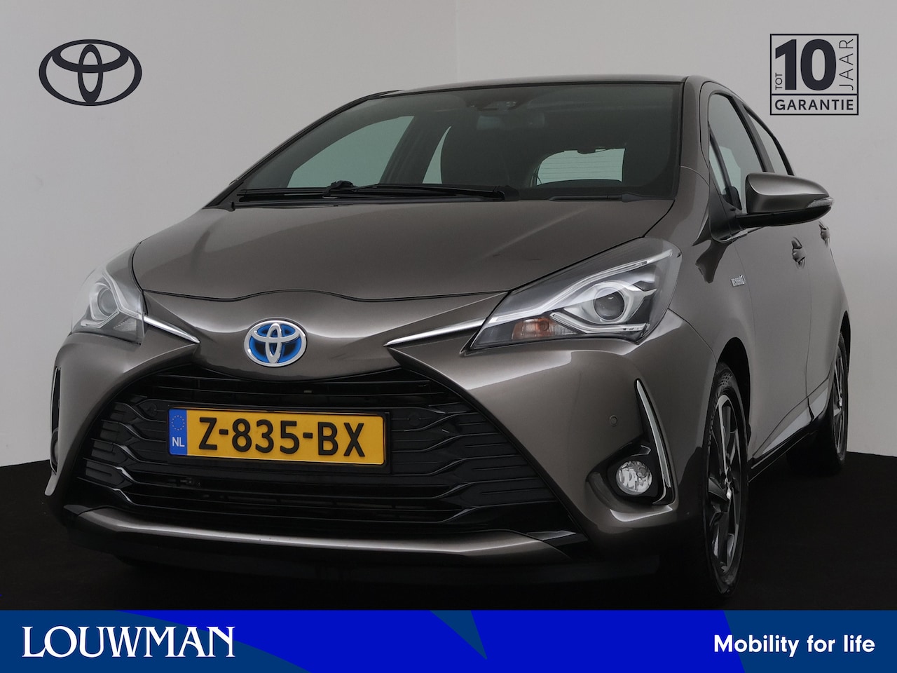 Toyota Yaris - 1.5 Hybrid Premium Limited | Camera | Panoramadak | LM velgen | Half leder | - AutoWereld.nl