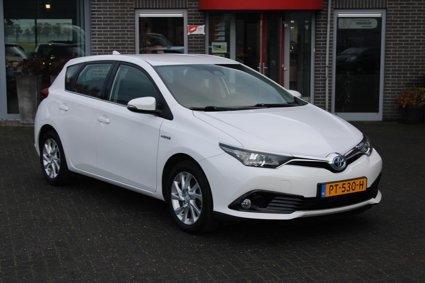 Toyota Auris - 1.8 Hybrid Aspiration Go Camera/Clima/Cruise Incl Garantie - AutoWereld.nl