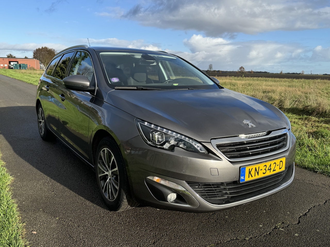 Peugeot 308 SW - 1.2 PureTech Blue Lease Premium 130PK!/PANODAK/NAVI/ECC/CRUISE - AutoWereld.nl