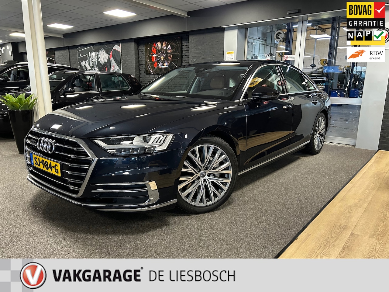 Audi A8 - 55 TFSI quattro / Leder / Navigatie / 20inch / B&O / stoel verwarming voor + achter. - AutoWereld.nl