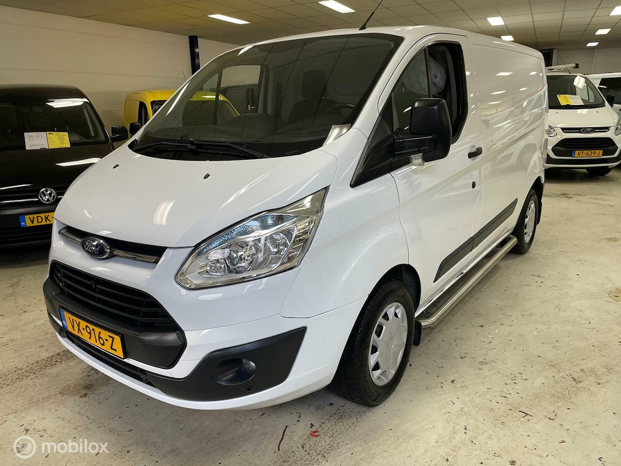 Ford Transit Custom - 310 2.2 TDCI L1H1 Airco Cruise Nav. - AutoWereld.nl