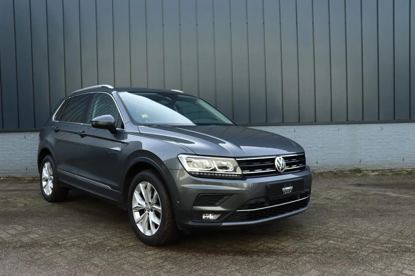 Volkswagen Tiguan - 2.0 TSI 4Motion Highline Business R 2.0 TSI 4Motion Highline Business R - AutoWereld.nl