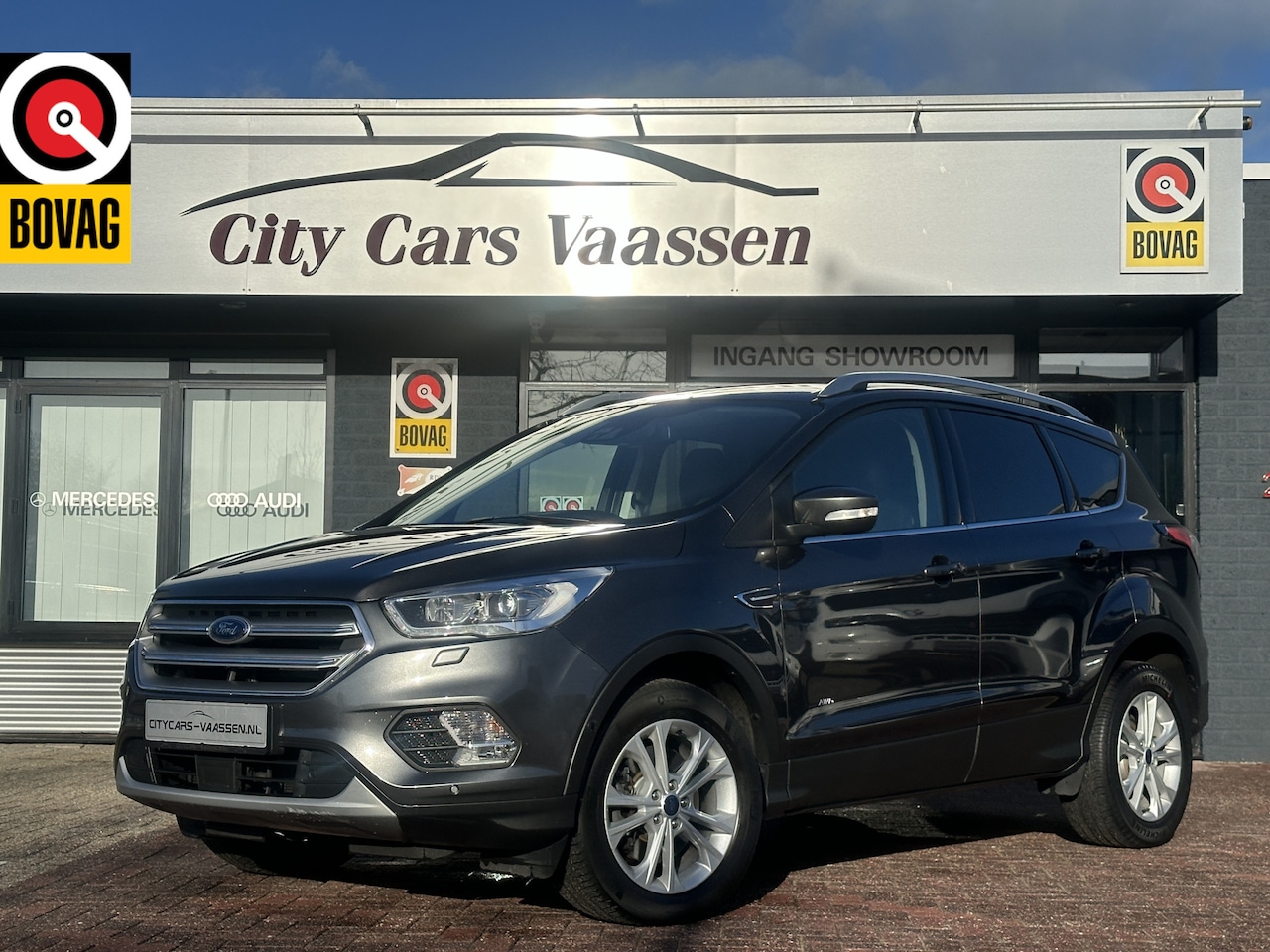 Ford Kuga - 1.5 EcoBoost Titanium 4wd automaat navigatie camera xenon cruise ctr elktr trekhaak half l - AutoWereld.nl