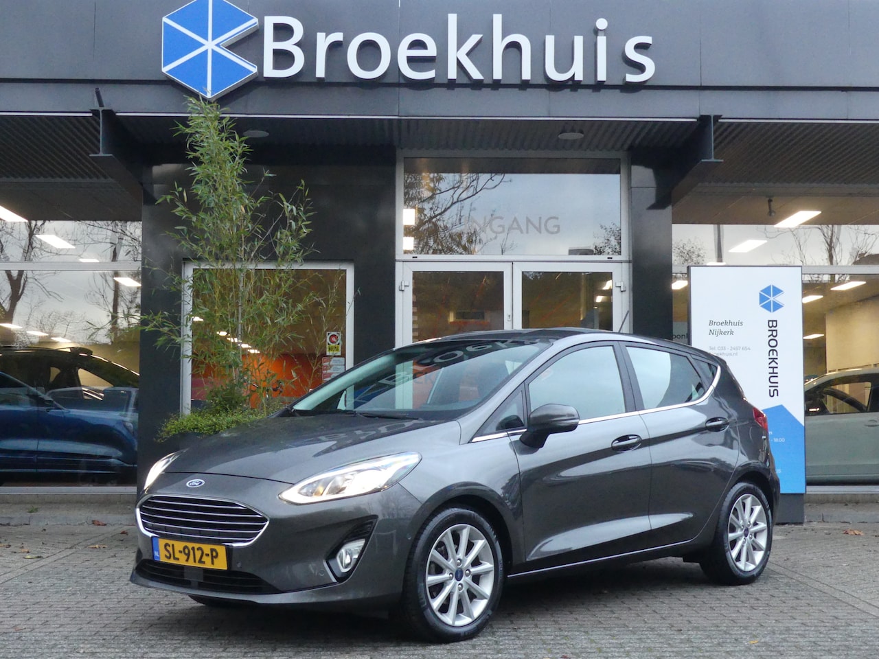 Ford Fiesta - 1.0 EcoBoost 100PK Titanium | ADAPTIVE CRUISE | NAVI | CAMERA | PARKEERSENSOREN V+A | - AutoWereld.nl