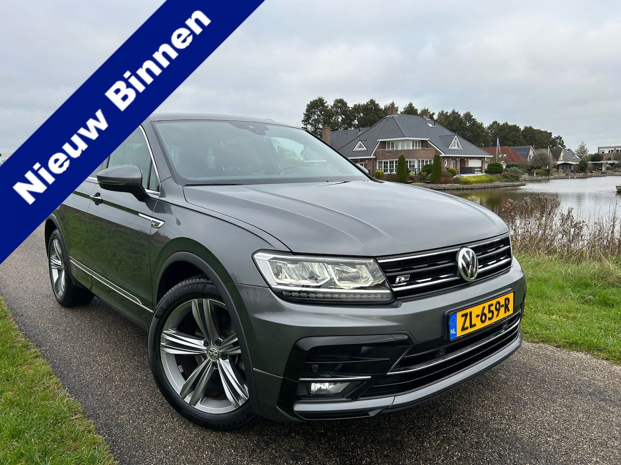 Volkswagen Tiguan - 1.5 TSI Highline R-Line Virtual cockpit / Led / Nieuwstaat! - AutoWereld.nl