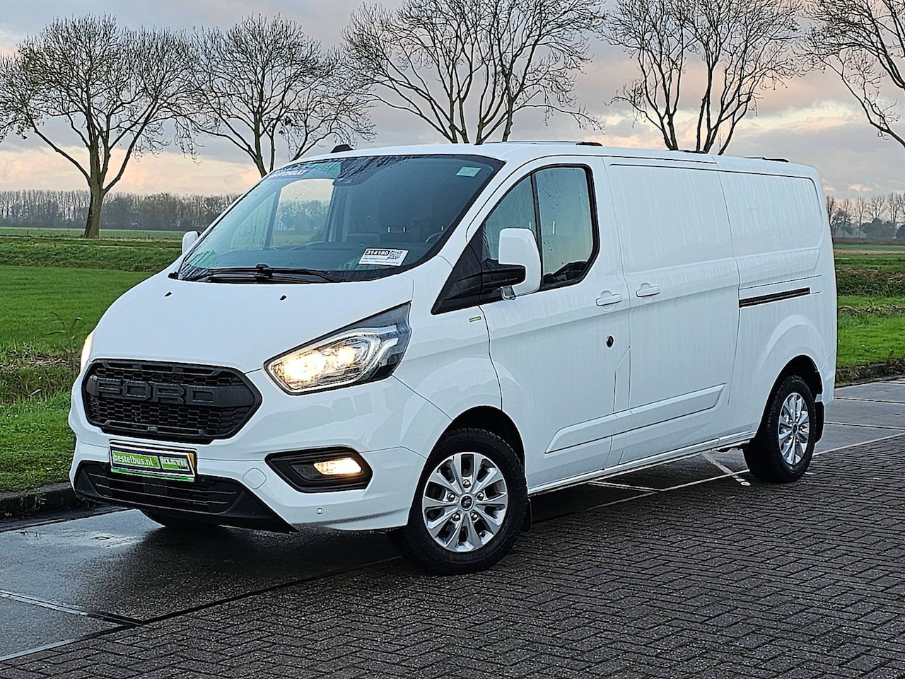 Ford Transit Custom - 300 2.0 TDCI L2H1 Trend 2xZijdeur Automaat Navi Airco 170Pk Camera Lm-Velgen Raptor-Grille - AutoWereld.nl