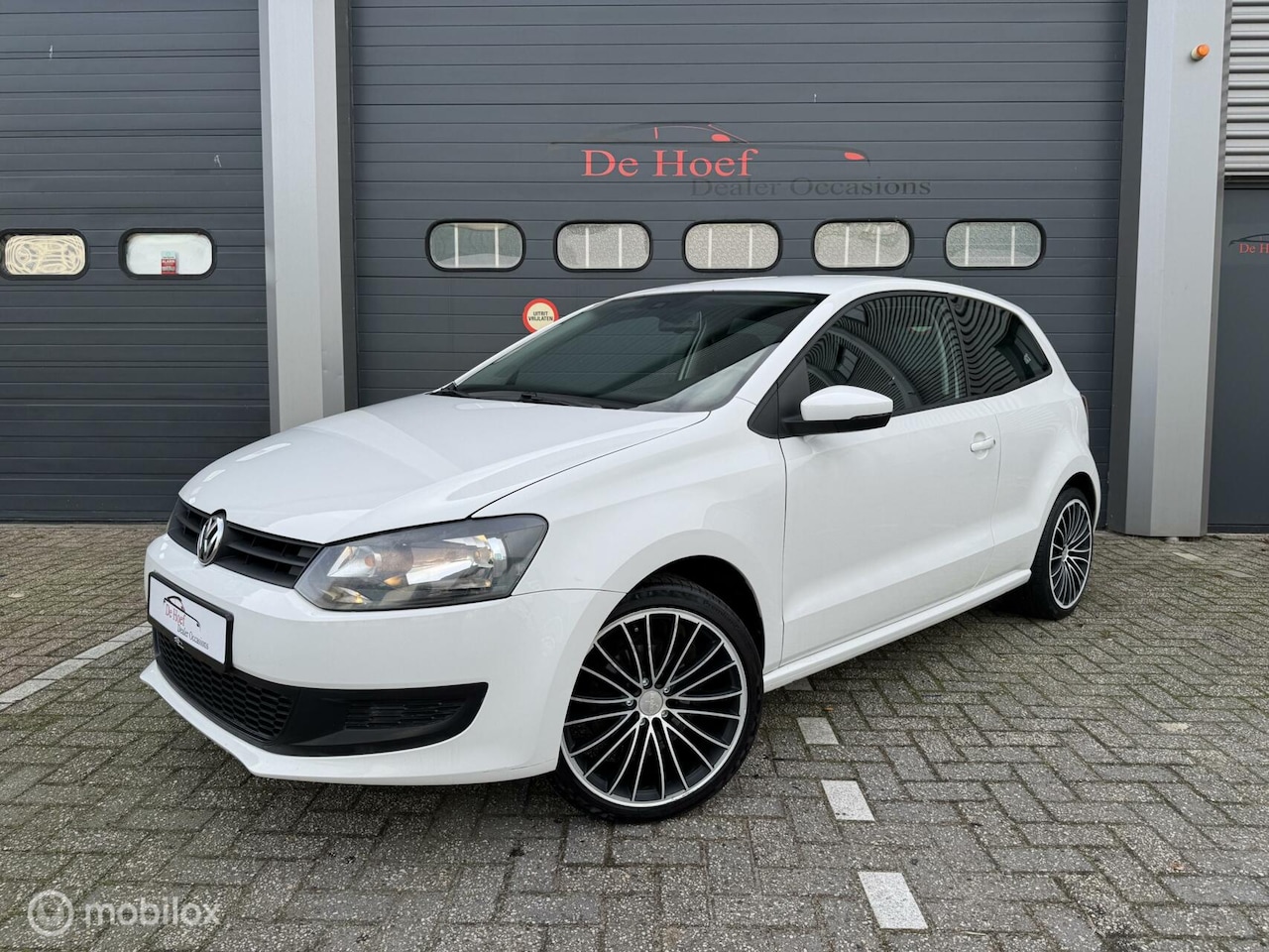 Volkswagen Polo - 1.2-12V Sport ✓Airco ✓Navi ✓Nw APK - AutoWereld.nl