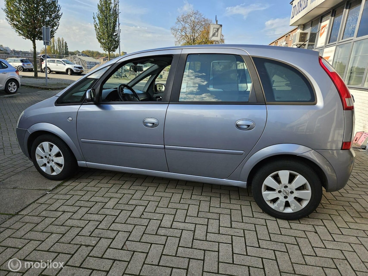 Opel Meriva - 1.6-16V Cosmo 1.6-16V Cosmo - AutoWereld.nl