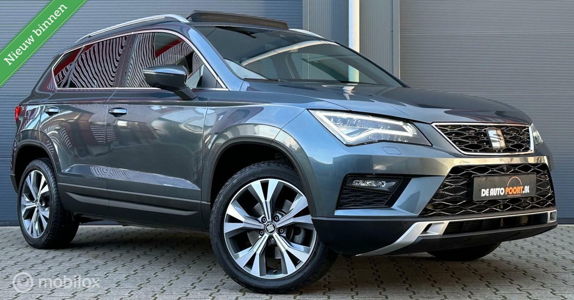 Seat Ateca - 1.4 EcoTSI Xcellence DSG Pano.dak/Trekhaak/Leder/ACC - AutoWereld.nl