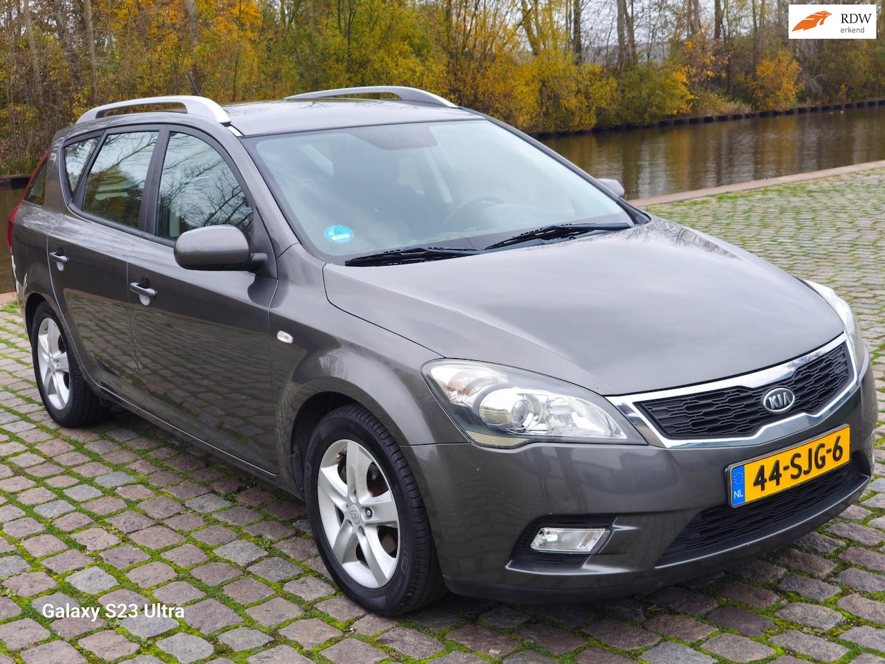 Kia Cee'd Sporty Wagon - 1.4 CVVT Navigator Plus Pack 1e eigenaar dealer onderhouden airco - AutoWereld.nl