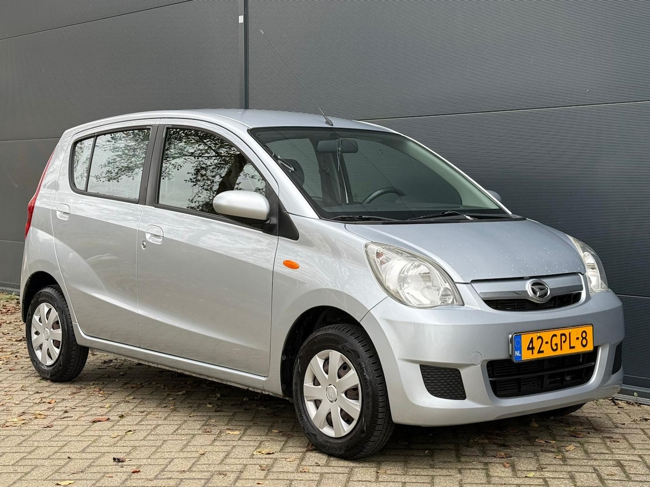 Daihatsu Cuore - 1.0 Premium AIRCO | ELEK RAMEN | NWE APK - AutoWereld.nl