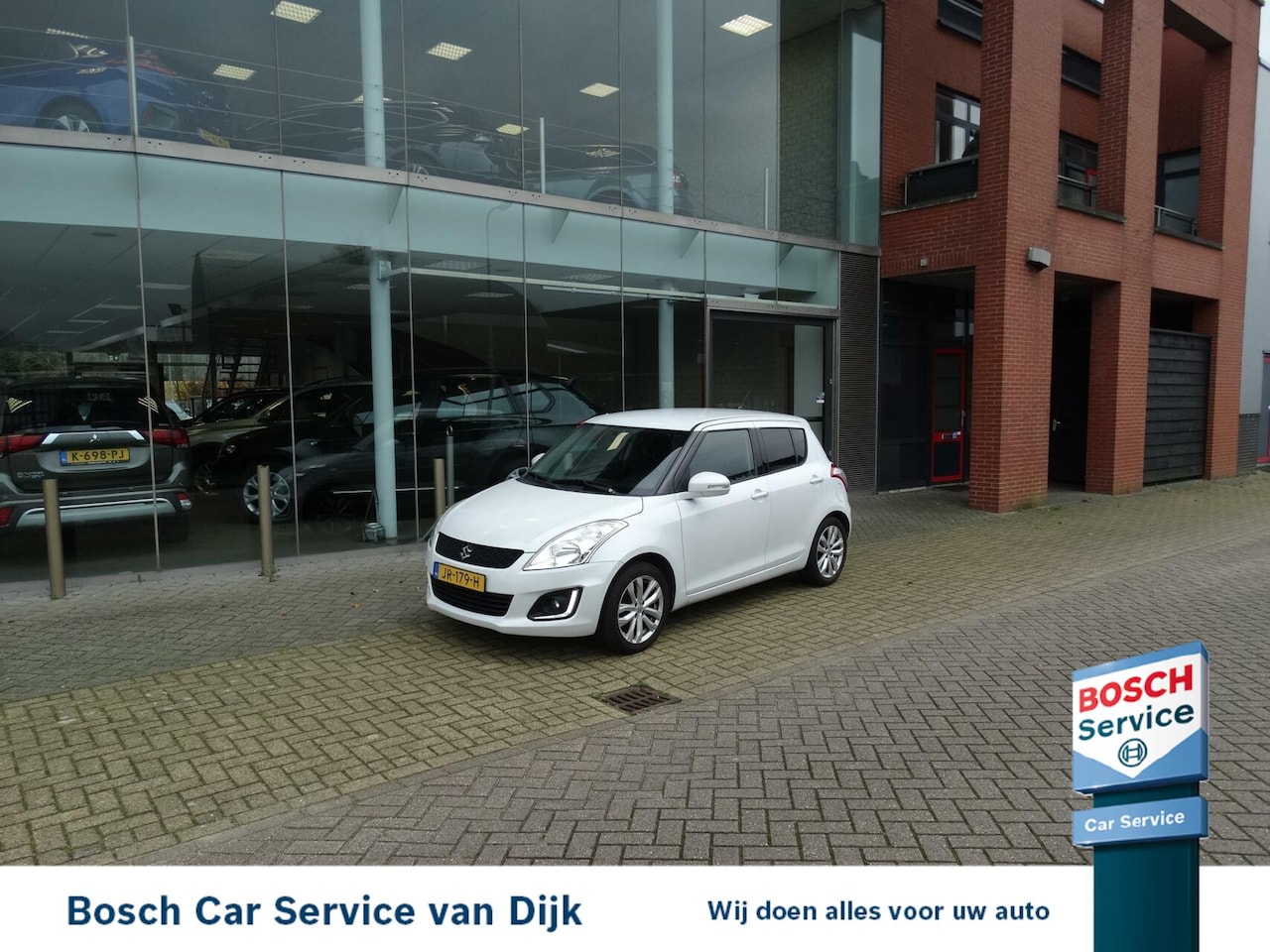 Suzuki Swift - 1.2 Bandit EASSS 5drs Airco / Cruise /Trekhaak - AutoWereld.nl