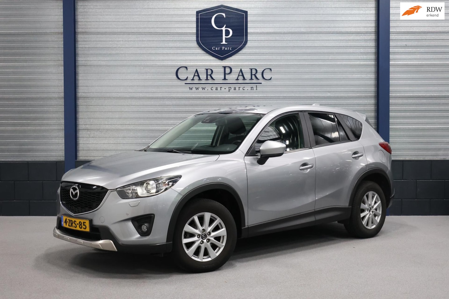 Mazda CX-5 - 2.0 Limited Edition 2WD XENON/NAVI/S.VERWARMING/AUX/LMV/CRUISE/ECC/12 MND GARANTIE! - AutoWereld.nl