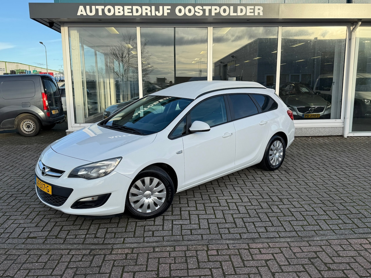 Opel Astra Sports Tourer - 1.3 CDTi Edition Grijs kenteken - AutoWereld.nl