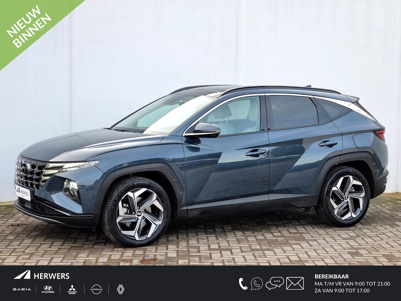 Hyundai Tucson - 1.6 T-GDI HEV Premium Sky Automaat / 1650KG Trekgewicht / Panoramadak / Schuif-/Kanteldak - AutoWereld.nl