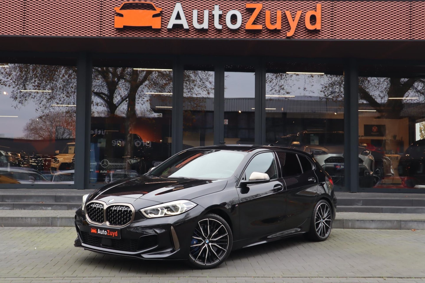 BMW 1-serie - M135i xDrive 306pk / Clima / PDC / DAB / Cruise /100% Dealer onderhouden - AutoWereld.nl