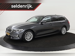 BMW 3-serie Touring - 330e eDrive Edition | Luxury Line | Adaptive Cruise | Trekhaak | DAB+ | Leder | Full LED |