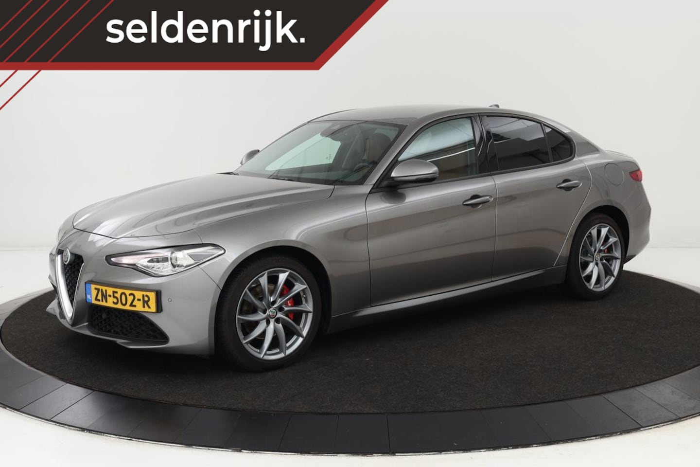 Alfa Romeo Giulia - 2.2d | 97.100km NAP | Leder | Xenon | Navigatie | Climate control | PDC | Cruise control | - AutoWereld.nl