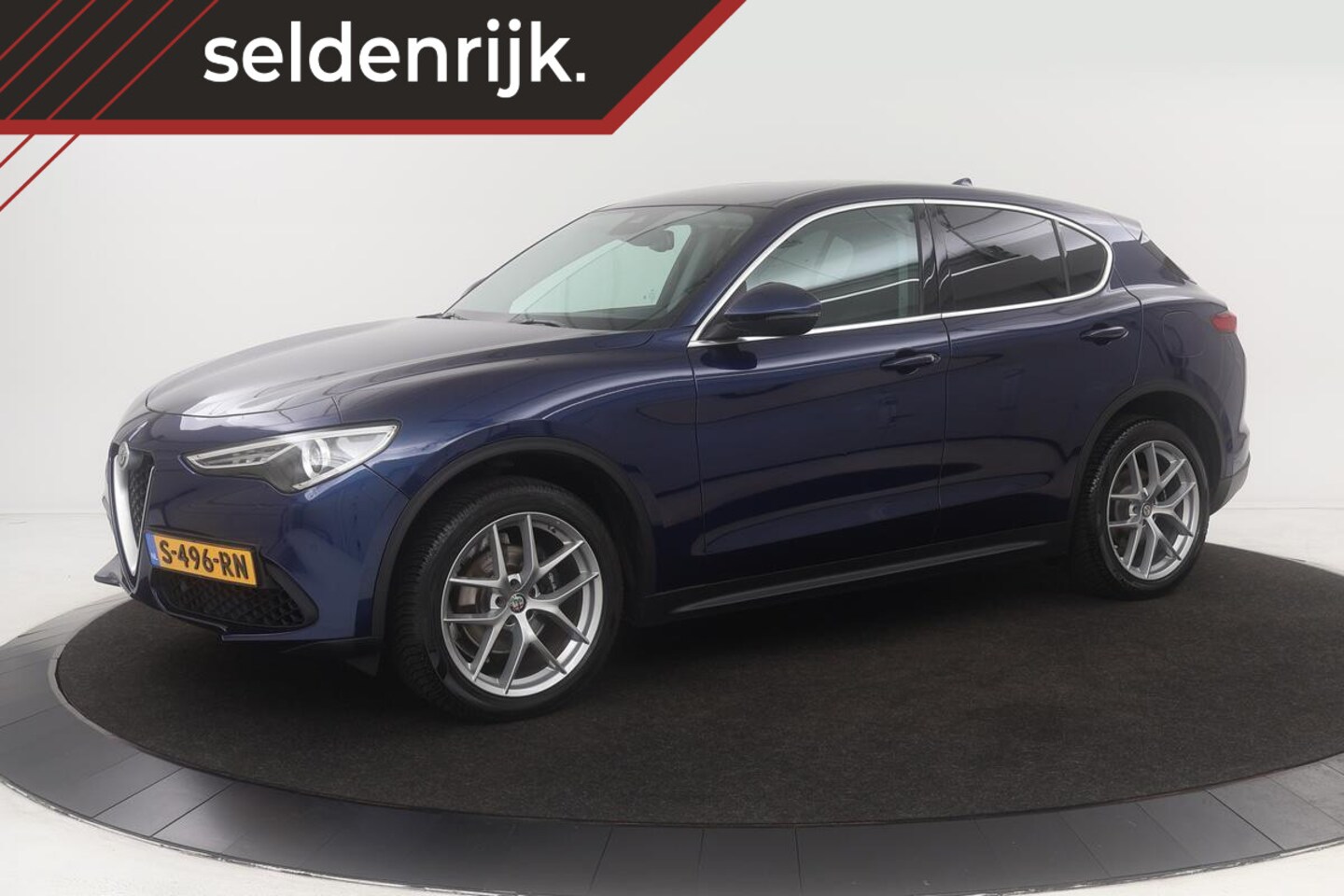 Alfa Romeo Stelvio - 2.0T AWD Super | Leder | Stoel & stuurverwarming | Camera | Navigatie | Memory | Xenon | K - AutoWereld.nl