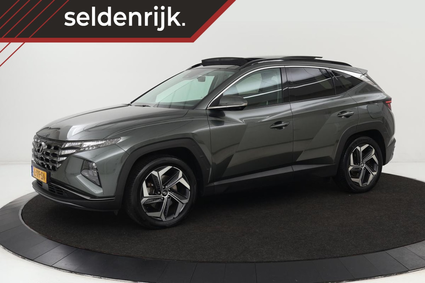 Hyundai Tucson - 1.6 T-GDI PHEV Premium Sky 4WD | Panoramadak | Stoelventilatie | Trekhaak | Leder | Adapti - AutoWereld.nl