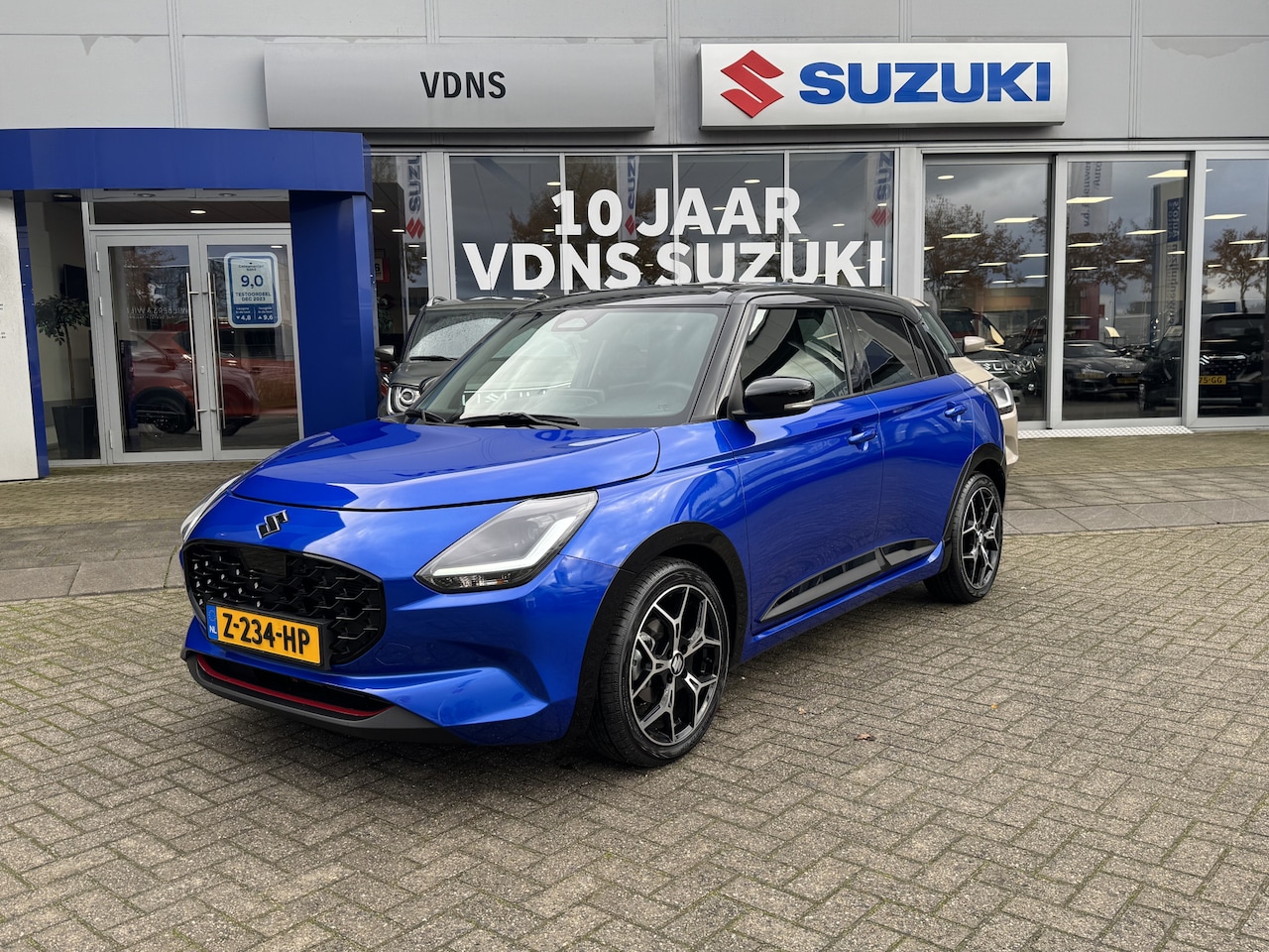 Suzuki Swift - 1.2 Style Smart Hybrid Demo BTW accessoirespakket twv. €3.700 per direct beschikbaar info: - AutoWereld.nl