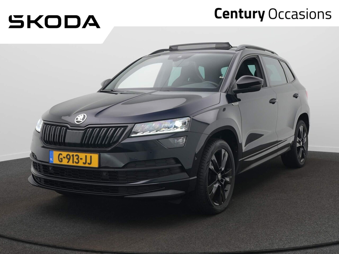 Skoda Karoq - 1.5 TSI ACT Sportline Business / Panodak / Elek. Klep / CANTON Audio / Camera - AutoWereld.nl