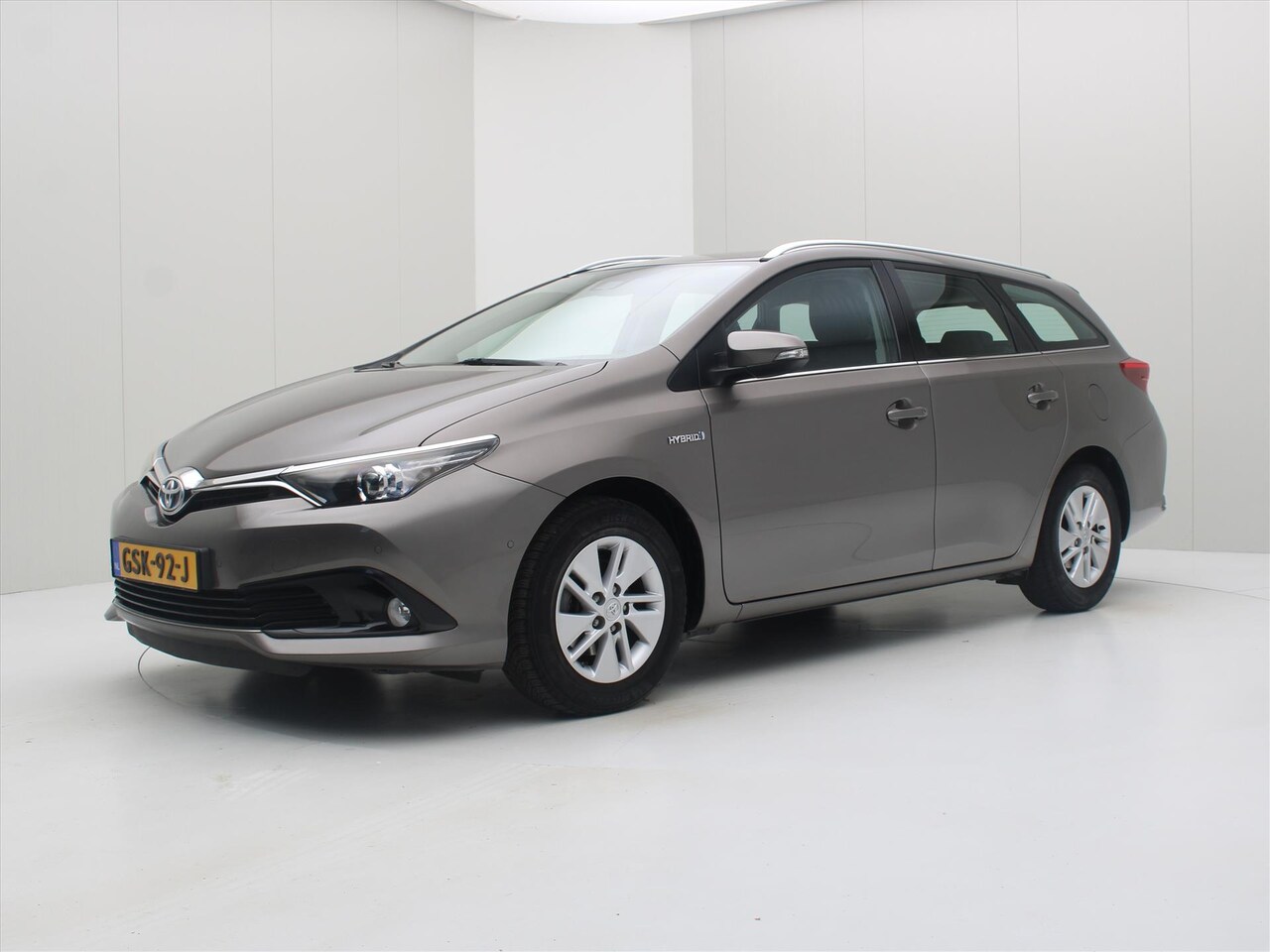 Toyota Auris Touring Sports - 1.8 VVT-i 136pk Hybrid CVT Business Plus [ HYBRID+PDC+CRUISE+NAV+CLIMATE ] - AutoWereld.nl