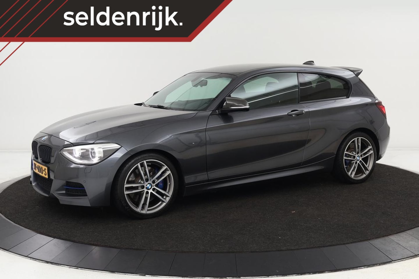 BMW 1-serie - M135i | Climate | Cruise | Alcantara | PDC | Stoelverwarming | Harman Kardon | Xenon | Nav - AutoWereld.nl