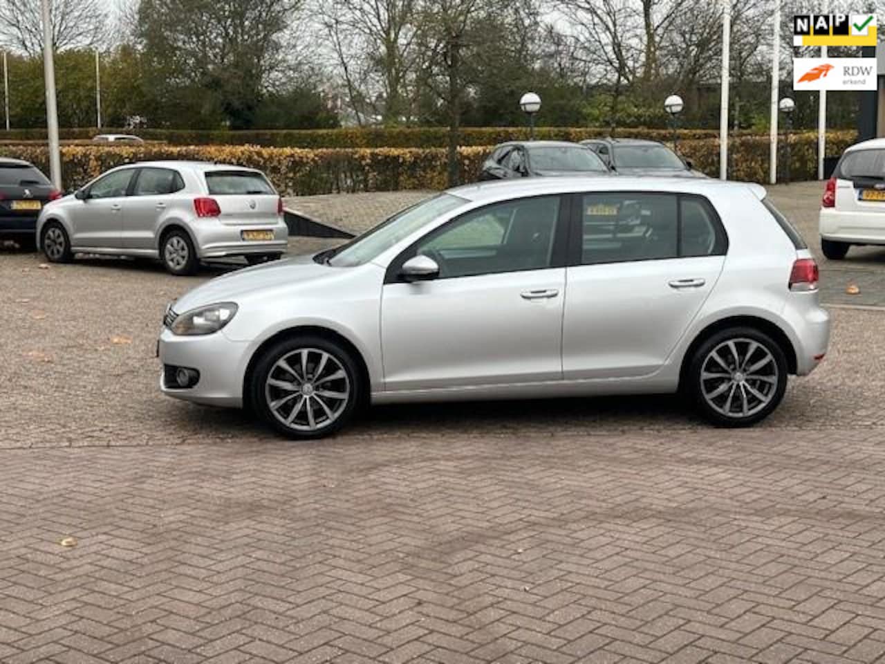 Volkswagen Golf - 1.2 TSI Highline BlueMotion 1.2 TSI Highline BlueMotion,bj.2011,kleur:grijs,5 deurs,navigatie,climate,APK 11/2025 en N - AutoWereld.nl