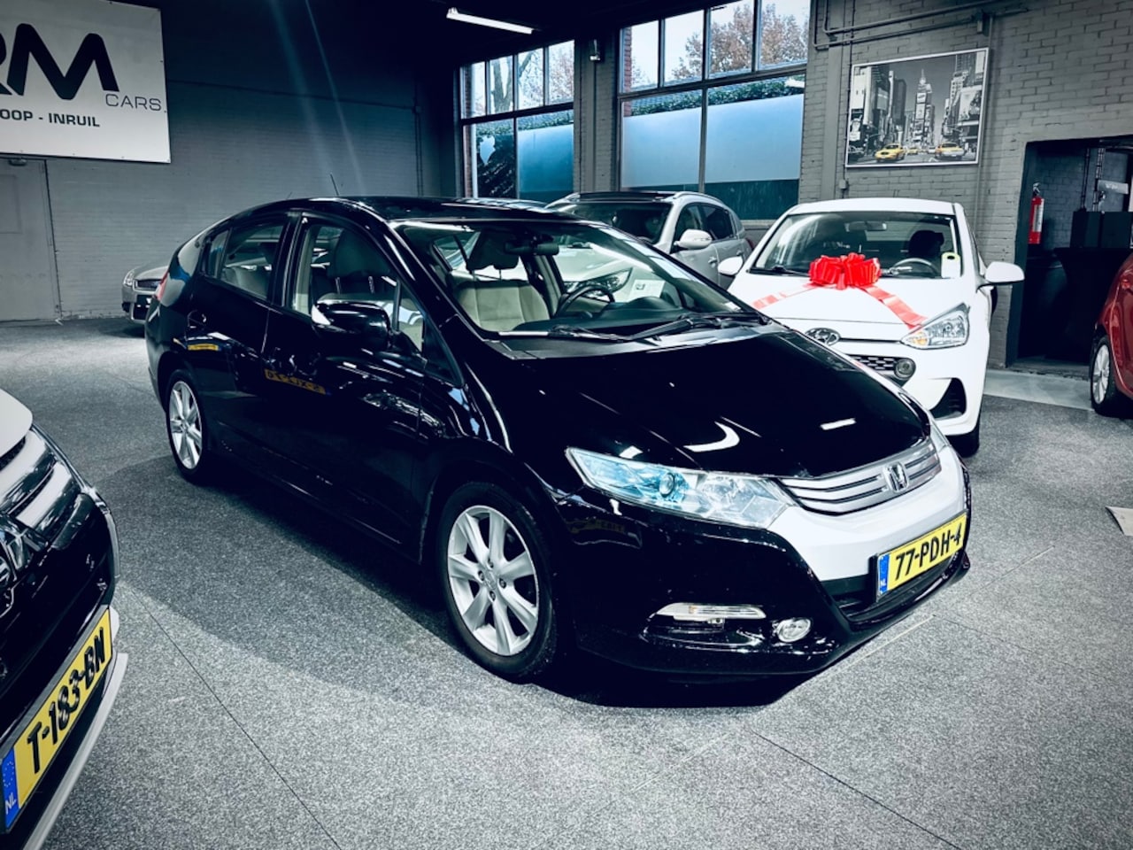 Honda Insight - 1.3 Elegance HYBRIDE - AUTOMAAT - CLIMA - CRUISE - DEALER ONDERHOUDEN - AutoWereld.nl