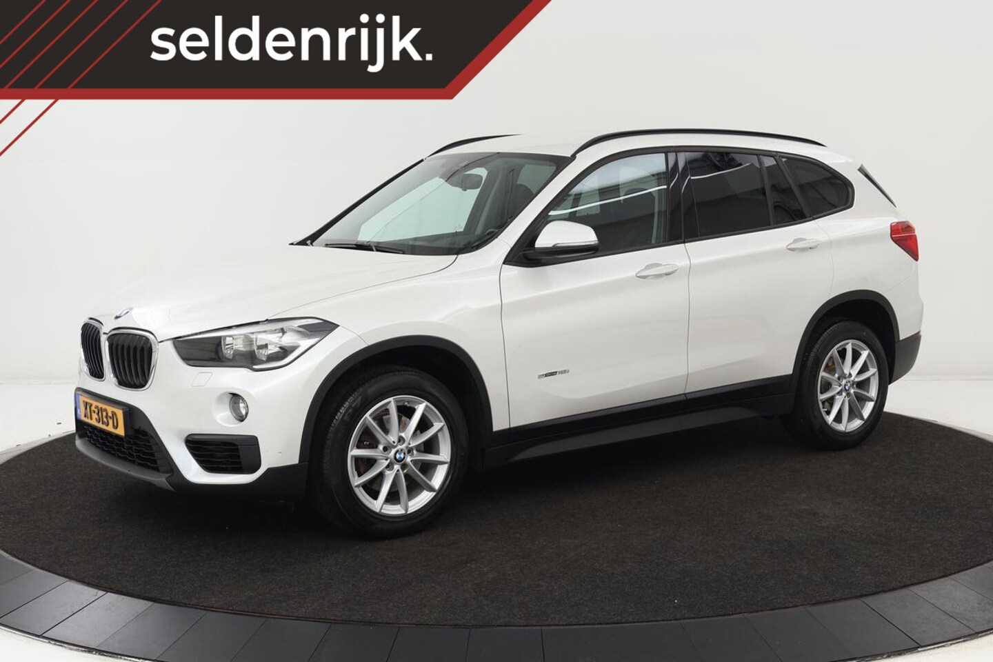 BMW X1 - sDrive18i | Stoelverwarming | PDC | Bluetooth | Airco - AutoWereld.nl