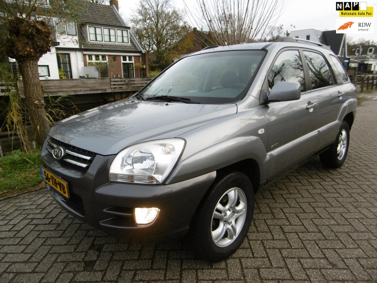 Kia Sportage - 2.7 V6 4WD 175pk Automaat Clima Cruise Trekhaak 1600kg - AutoWereld.nl