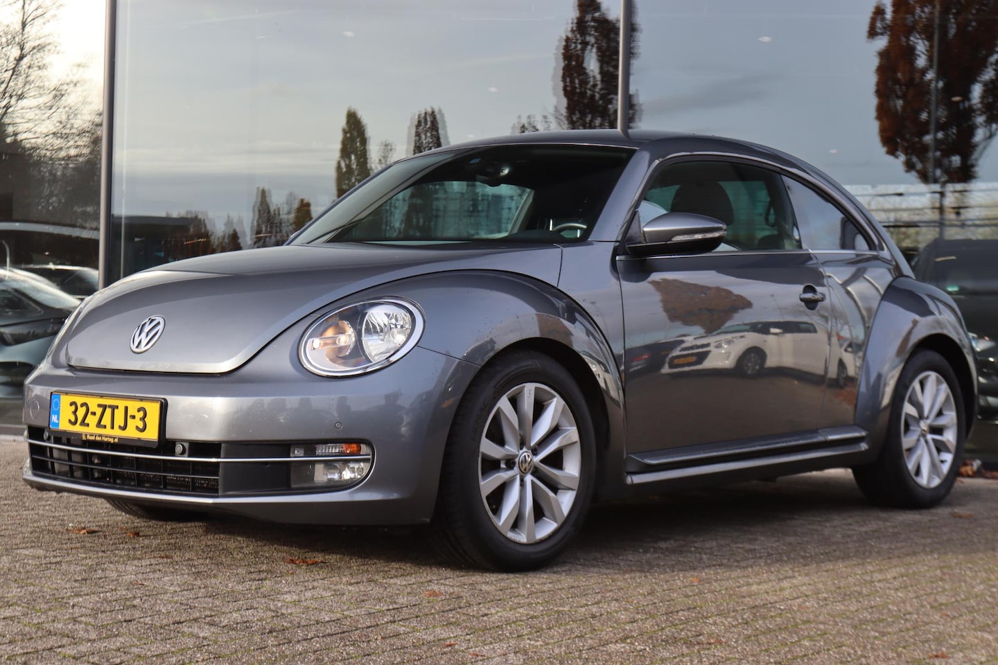 Volkswagen Beetle - 1.2 TSI DESIGN | CRUISE | NAVI | CLIMATE | PDC - AutoWereld.nl