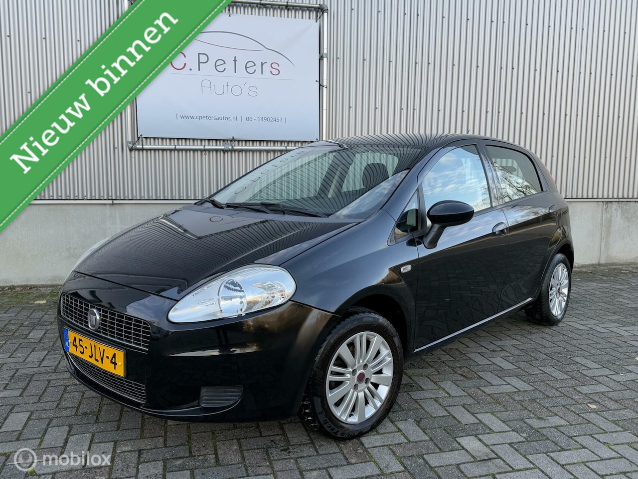 Fiat Grande Punto - 1.4 Edizione 2009 / Airco / Cruisecontrol / 5deurs / 2e eigenaar NAP - AutoWereld.nl