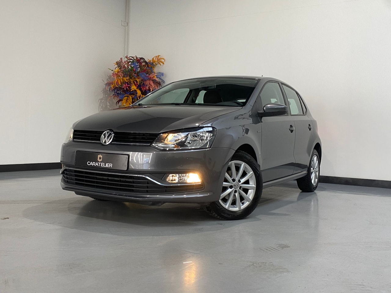 Volkswagen Polo - 1.2 TSI Highline / Lounge / 1e eig / Navi / Cruise control - AutoWereld.nl