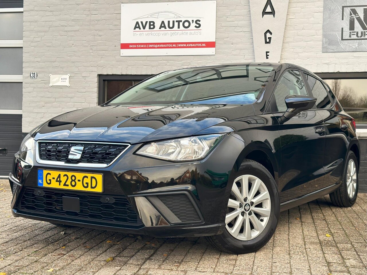 Seat Ibiza - 1.0 TSI Style Business Intense Navi Clima Cruise - AutoWereld.nl