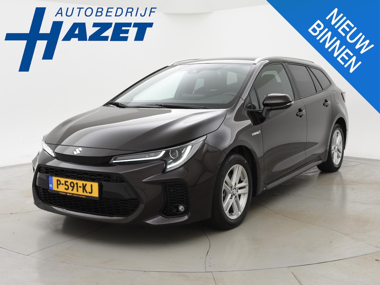 Toyota Corolla Touring Sports - 1.8 HYBRID *7.019KM* STYLE + ADAPTIVE CRUISE / TREKHAAK / STUURVERW. / CAMERA / LED - AutoWereld.nl