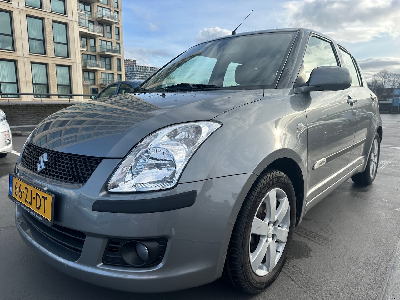 Suzuki Swift - 1.3 Exclusive AUTOMAAT 1e Eig Cruise Navi Keyless - AutoWereld.nl