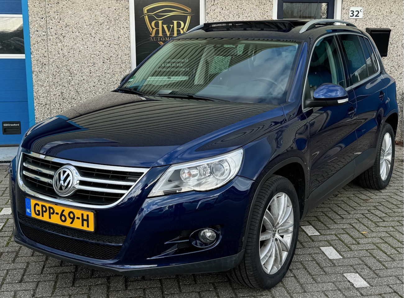 Volkswagen Tiguan - 2.0 TSI AUT TREKHAAK PANO XENON Comfort&Design 4Motion - AutoWereld.nl